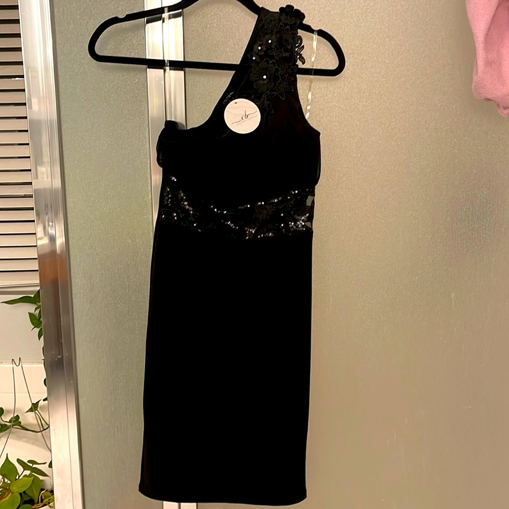 Beautiful Off the shoulder never worn LBD